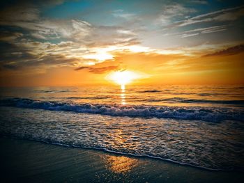 Scenic view of sea against sky during sunset