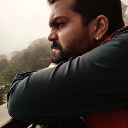 Portrait of young man looking away