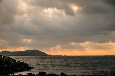 Scenic view of sea against sky during sunset