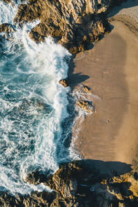 High angle view of rocks on beach