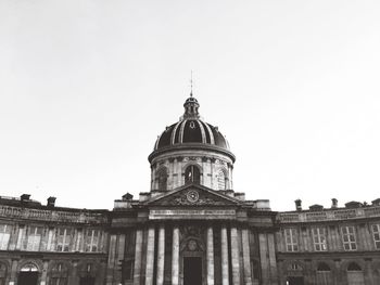 Low angle view of historic building against clear sky