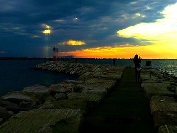 Scenic view of sea at sunset