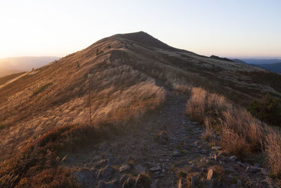 Scenic view of mountain against sky during sunset