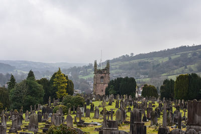 Panoramic view of cemetery against sky