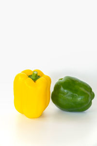 Close-up of yellow bell pepper against white background