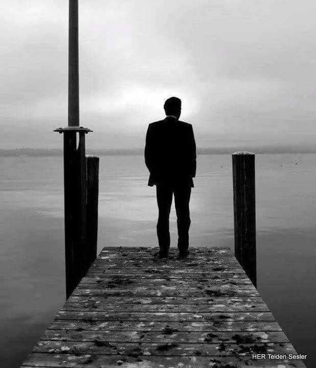 rear view, sea, water, full length, pier, sky, horizon over water, standing, lifestyles, the way forward, wood - material, walking, men, tranquility, railing, leisure activity, tranquil scene, cloud - sky