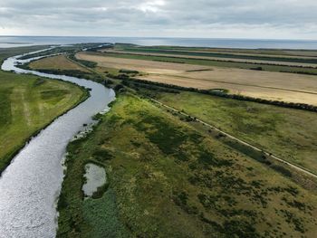 High angle view of road amidst field