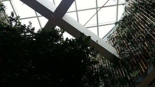 Low angle view of skylight in building