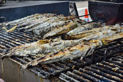 Close-up of fish on barbecue grill