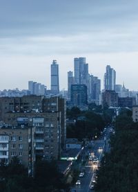 High angle view of buildings in city against sky