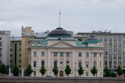 Facade of historic building against sky