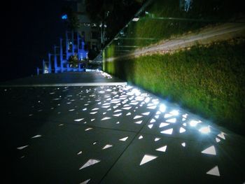 Illuminated road at night