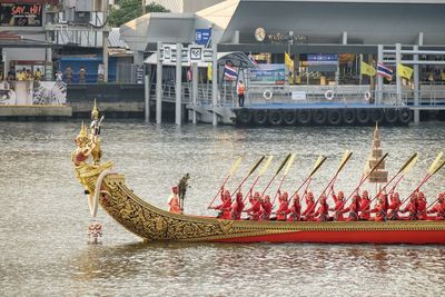 People on boat in river