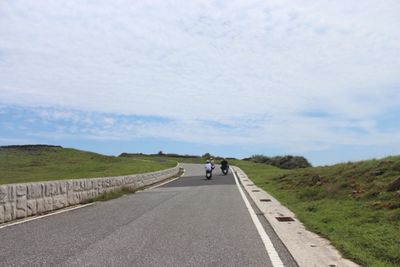 Country road passing through landscape