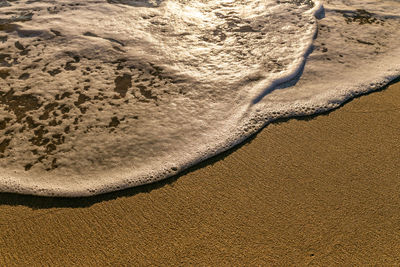 High angle view of sand on beach