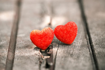 Close-up of red heart shape on table