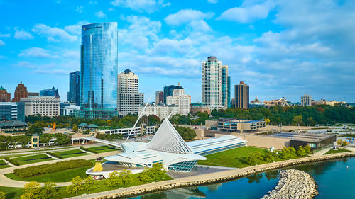 Modern buildings in city against sky