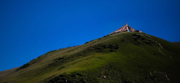 Low angle view of mountain against clear sky