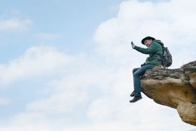 Low angle view of statue against sky