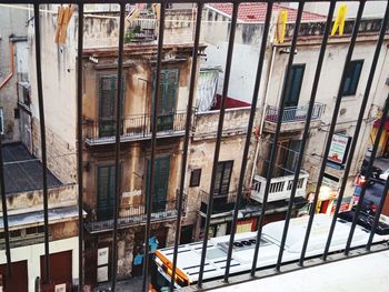 Buildings by street in city