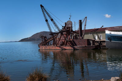 Abandoned ship against sky