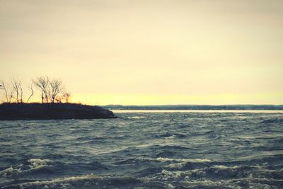 Scenic view of sea at sunset