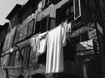 Low angle view of clothes drying on balcony