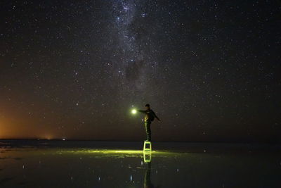 Scenic view of star field against sky at night