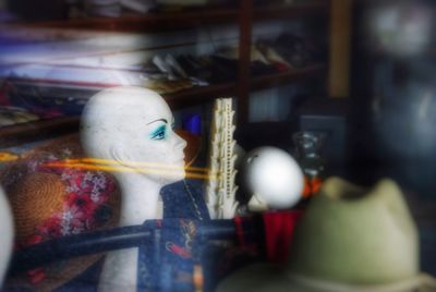 Close-up of statues in store