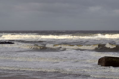 Scenic view of beach and sea against sky