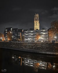 Illuminated buildings in city at night