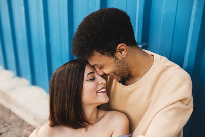 Portrait of smiling young couple