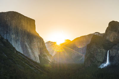 Scenic view of mountains against sky during sunset