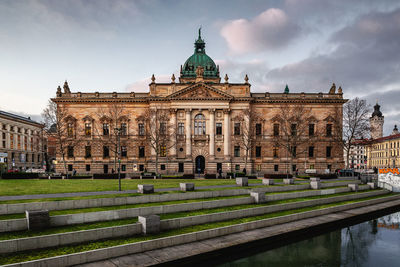 Facade of historic building against sky
