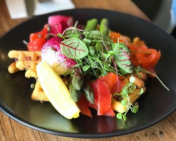 High angle view of salad in plate on table