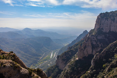 Scenic view of rocky mountains against sky