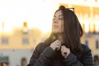 Portrait of mature woman smiling with unfocused background at florence, italy. 50mm lens