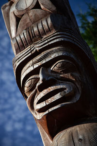 Low angle view of statue against sky