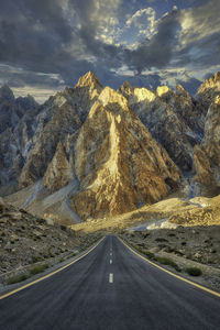 Road amidst landscape against sky