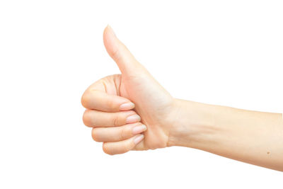 Close-up of hands over white background