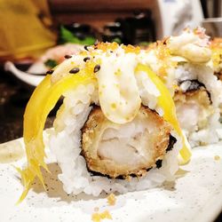 Close-up of sushi served in plate