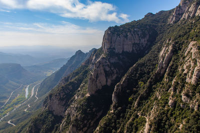 Scenic view of rocky mountains against sky