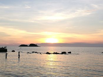 Scenic view of sea against sky during sunset