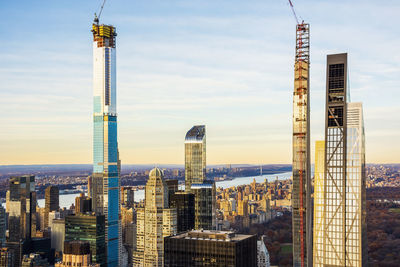 Modern buildings in city against sky