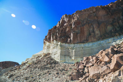 Scenic view of rocky mountains against clear blue sky