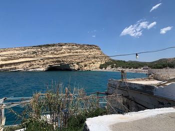 Scenic view of sea against blue sky