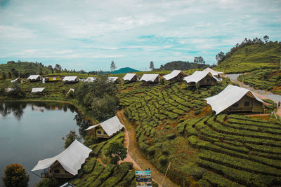 High angle view of agricultural landscape against sky