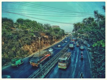 High angle view of cars on street in city