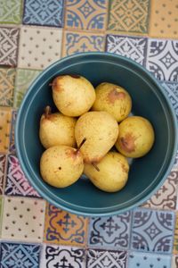 Directly above shot of fruits in plate on table