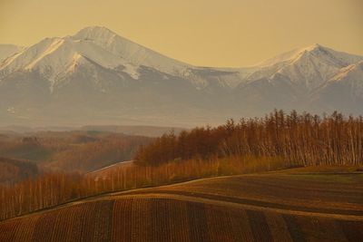 Scenic view of mountains against sky during winter